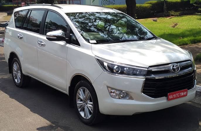Innova Crysta car hire Ahmedabad — spacious family SUV with driver